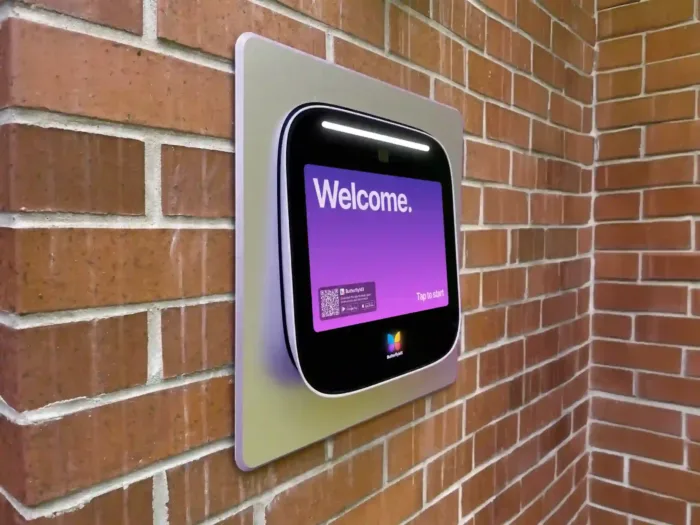 Recessed video intercom installed in a brick wall