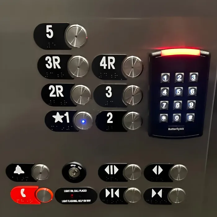 Elevator keypad reader installed beside the floor selection buttons