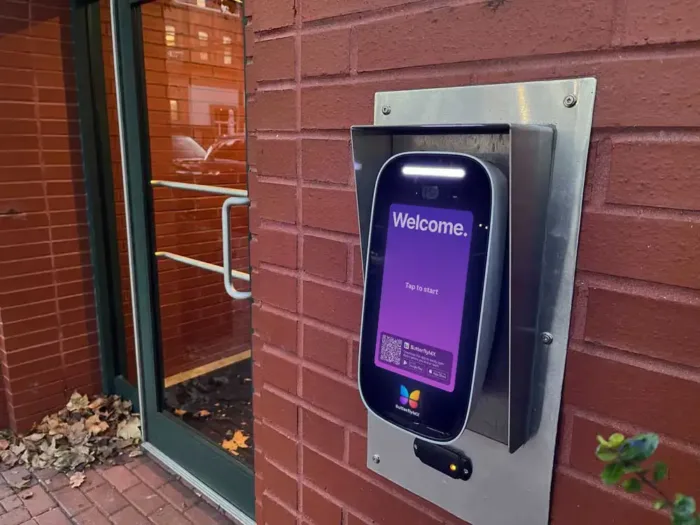 ButterflyMX 8in Video Intercom installed on a brick wall.