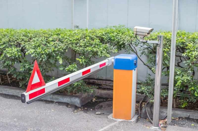 gate barrier arm to reduce tailgating at gated community