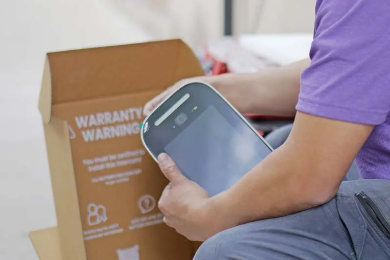 Installer unboxes the ButterflyMX Video Intercom