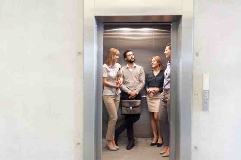 Visitors in an elevator cab