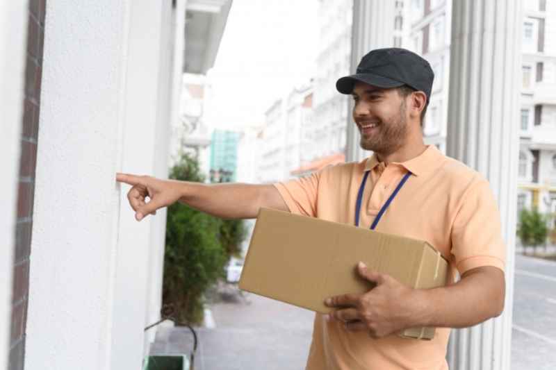 Package courier requesting access via a doorbell phone system.