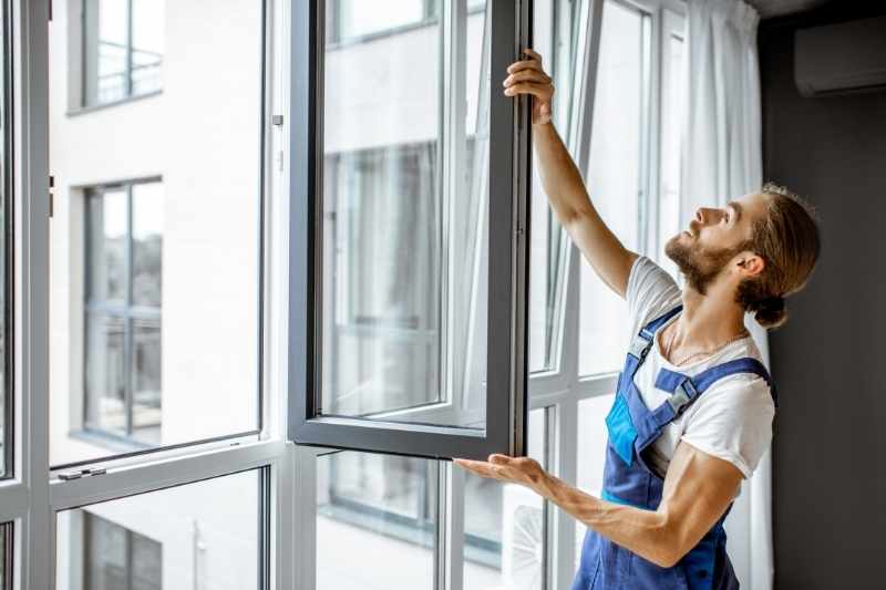 eco-friendly apartment living resident insulates windows