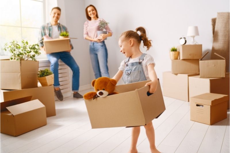 Parents and children gather in their family friendly apartment