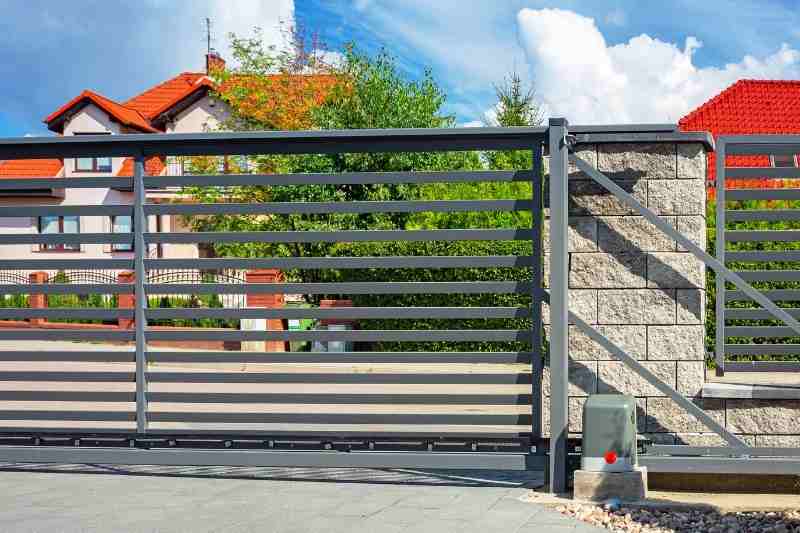 Sliding gate in front of gated community