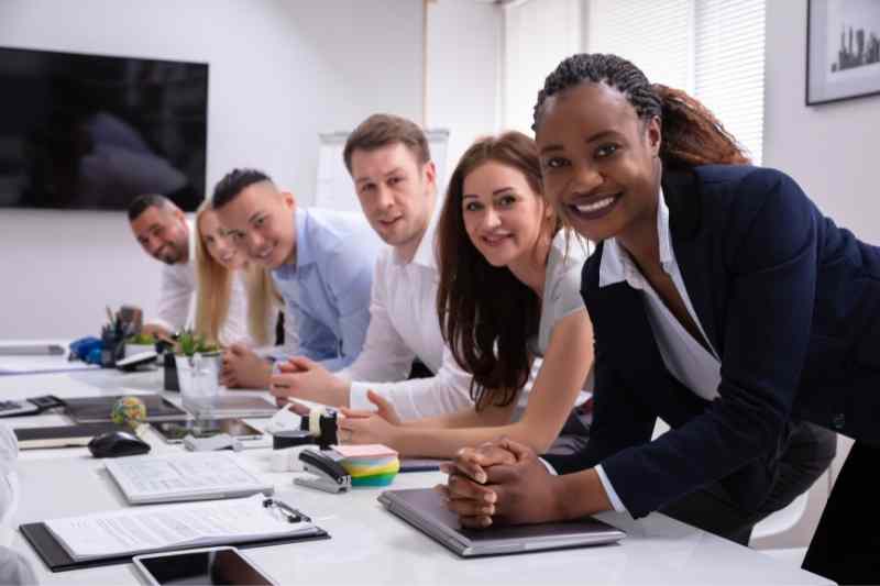 a group of property management staff at a table