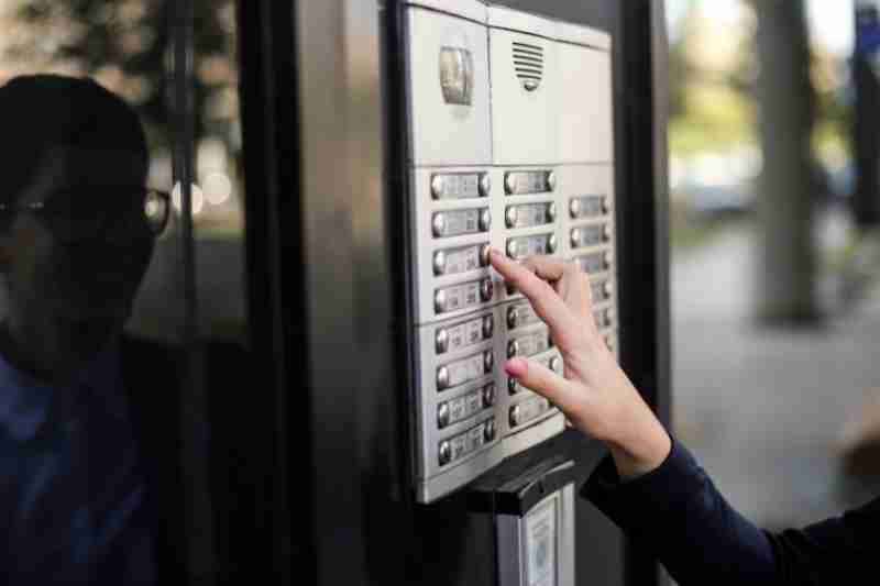 resident using retrofit intercom system