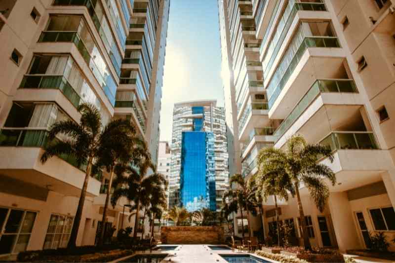 Two multifamily buildings facing each other, condo vs. apartment