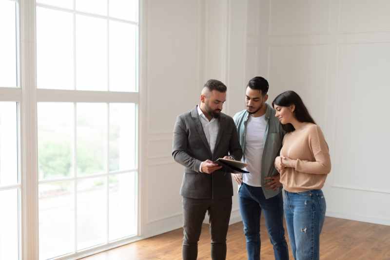 tenants view an apartment they found on an internet listing service.