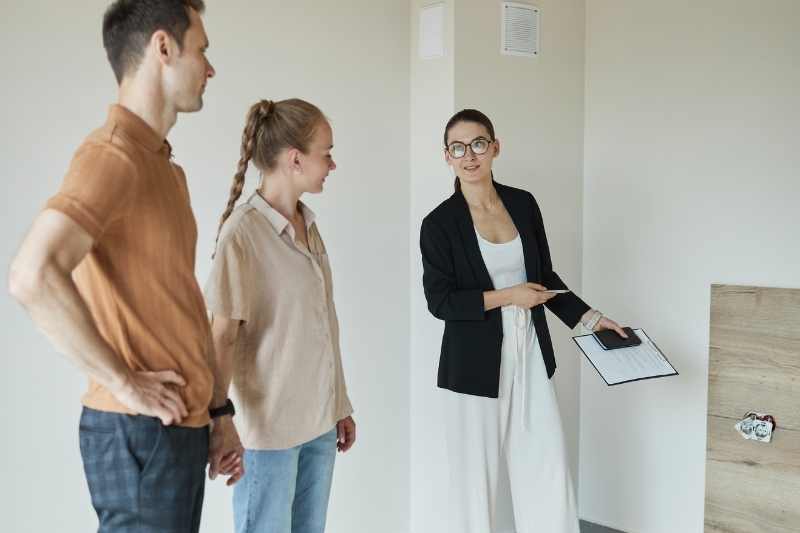 Property manager leads prospects on a tour.