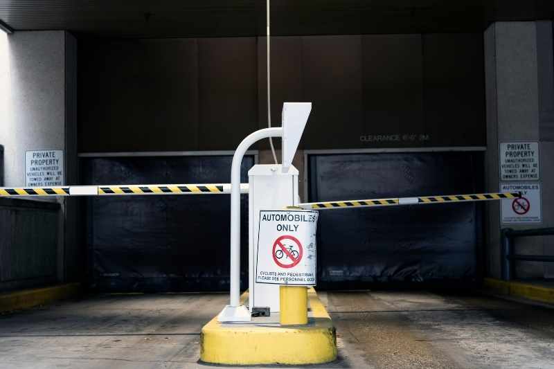 Parking garage security system with gate. 