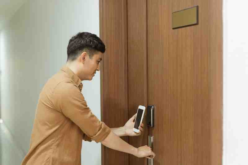 resident using NFC access control system