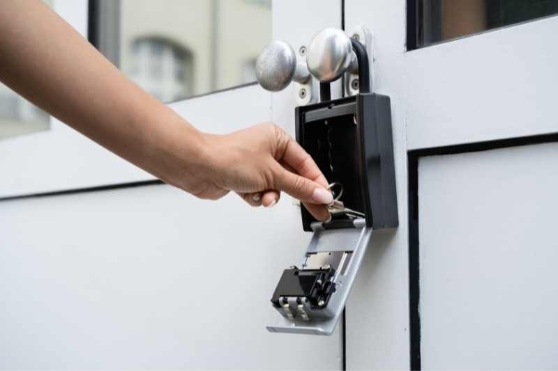 placing a key in a key lock box