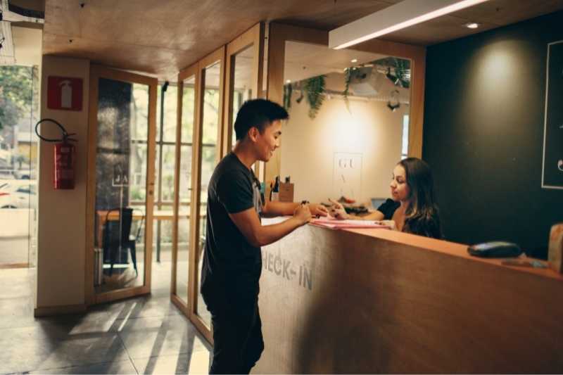 front desk staff managing guest