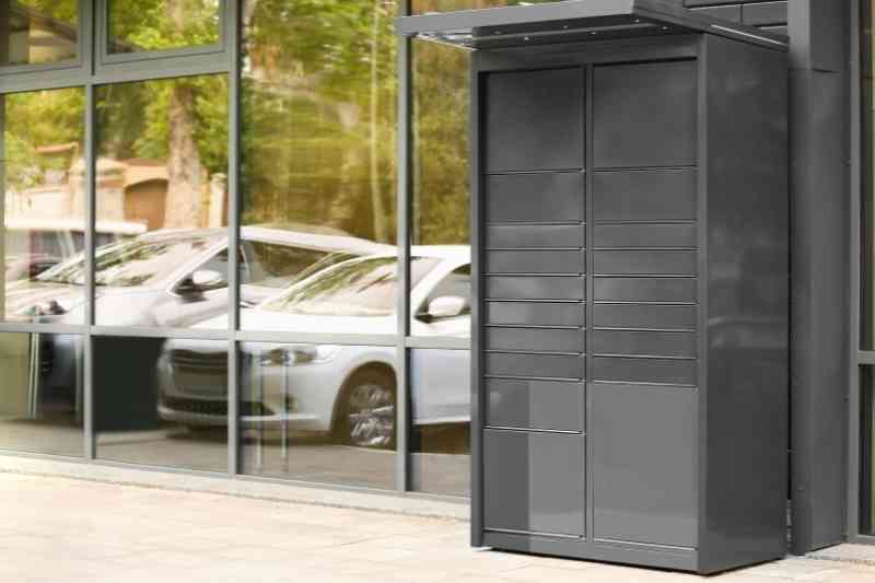 Outdoor parcel locker outside apartment.