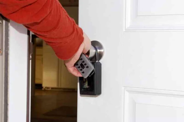 Opening a door using a lockbox.