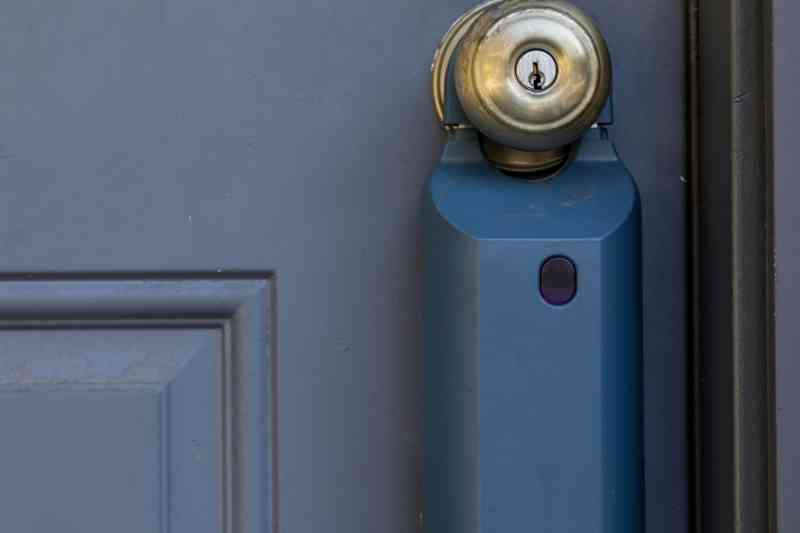 Smart key lock box on a front door.