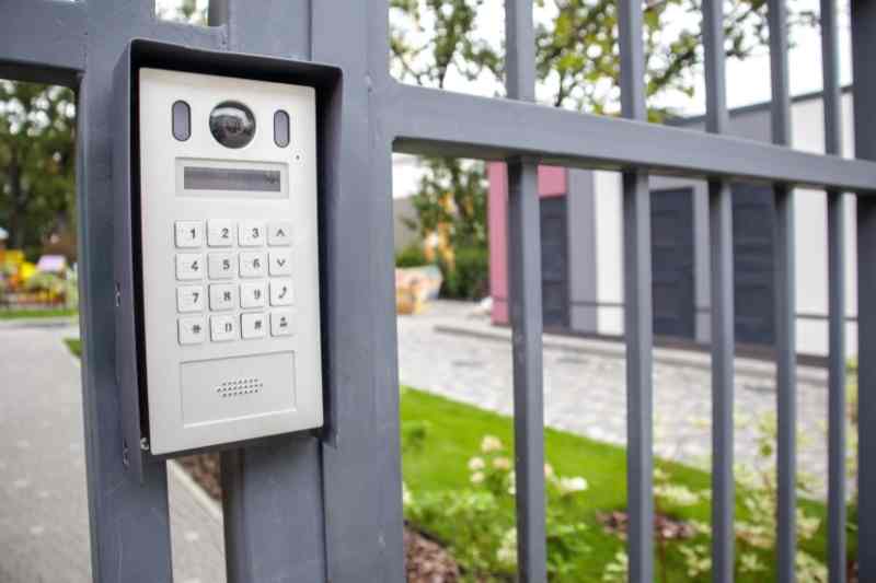 Video intercom at gated entrance.