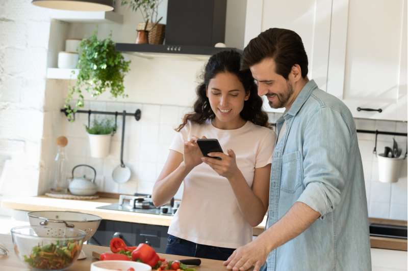 couple cooking dinner in a residential property