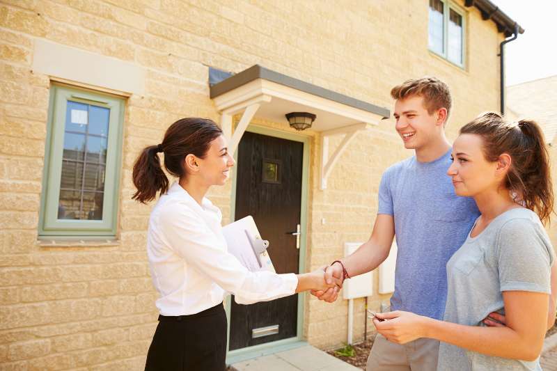 property manager meeting young couple