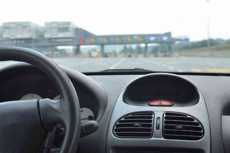 Using a windshield tag for vehicle access control.