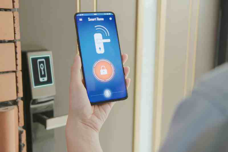 Unlocking a Bluetooth-enabled smart lock with a smartphone.