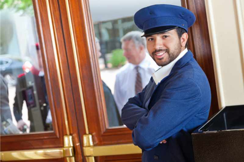 Doorman services (pictured above) are distinct from a concierge.