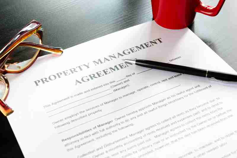 Property management agreement mentioning a lease renewal fee.