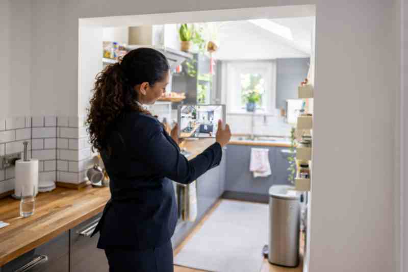 Real estate agent conducting a virtual tour.