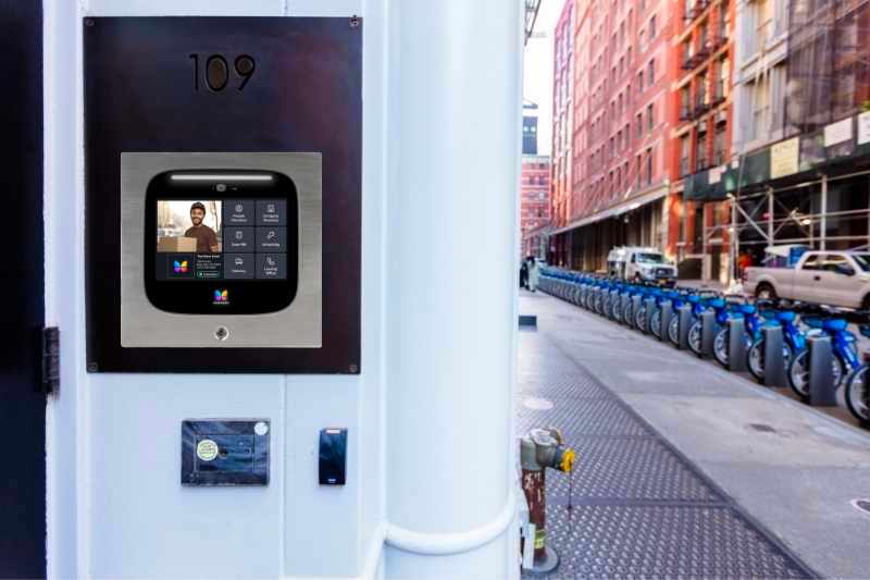 touchscreen intercom at the entrance of a multifamily building