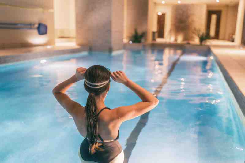 resident using pool wellness amenity