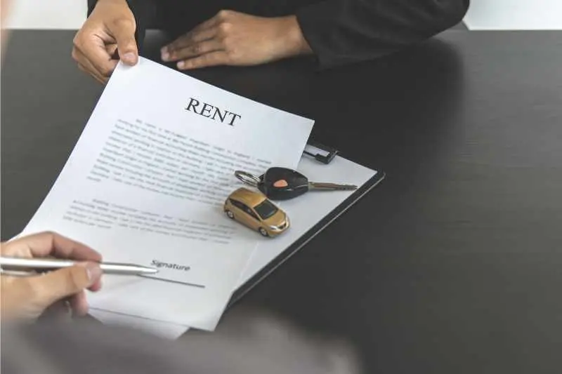 A resident signs a lease for deferred rent.