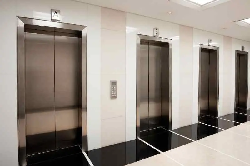 High-rise apartment management can involve elevator maintenance.