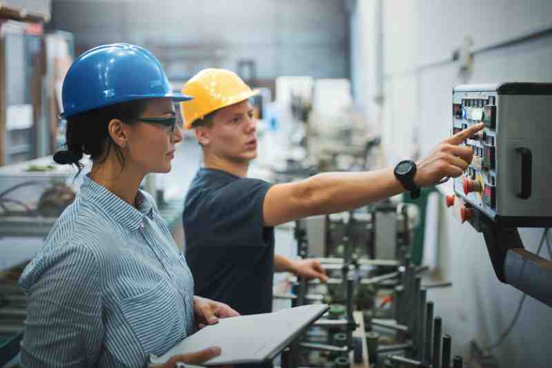 Man and woman completing their building operator certification.