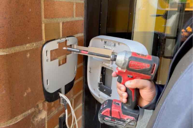 installer installs the new intercom backplate