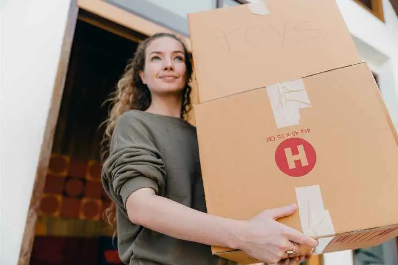 A woman moving after receiving her notice to move out letter.