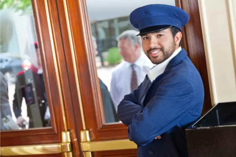 A happy apartment doorman.