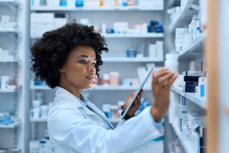 Pharmacist using pharmacy security systems to make property safer.