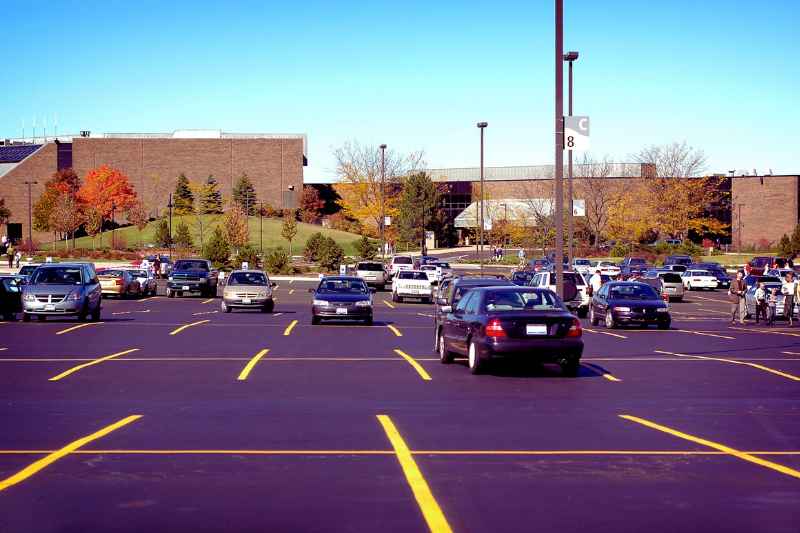 A parking lot in need of condo visitor parking management.
