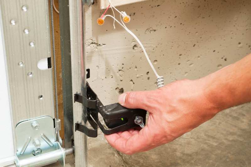 door contact sensor undergoing maintenance