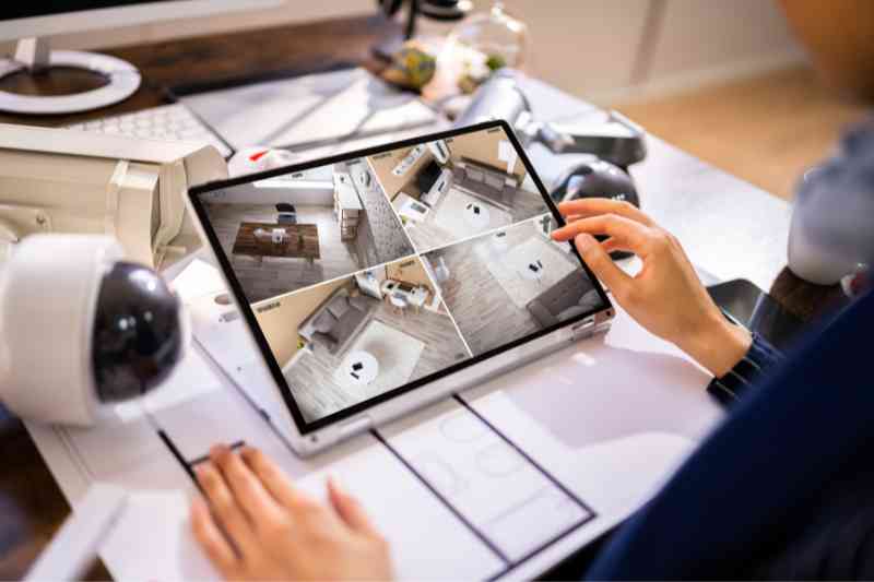 Person monitoring an apartment with access control and video surveillance integrations.