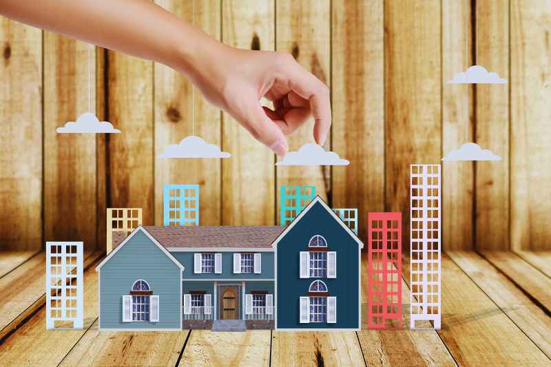 A property manager interacts with a property display that represents property management software.