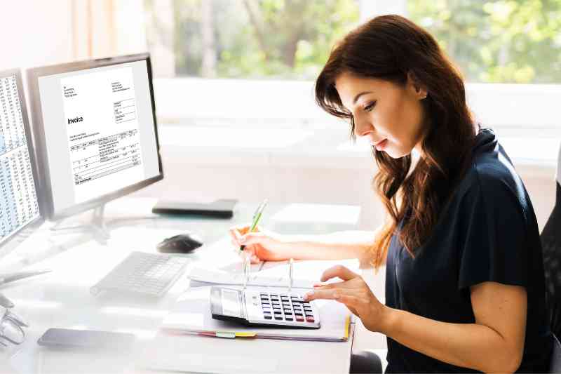 Woman using a property management software company.