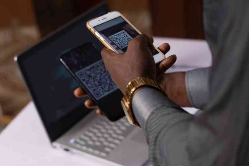 Property manager downloading a QR code building image.