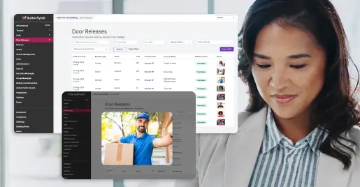 Property manager in office holding tablet and smiling with pop up overlay of ButterflyMX dashboard next to her