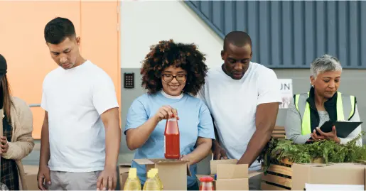 Non-profit workers bagging food and produce