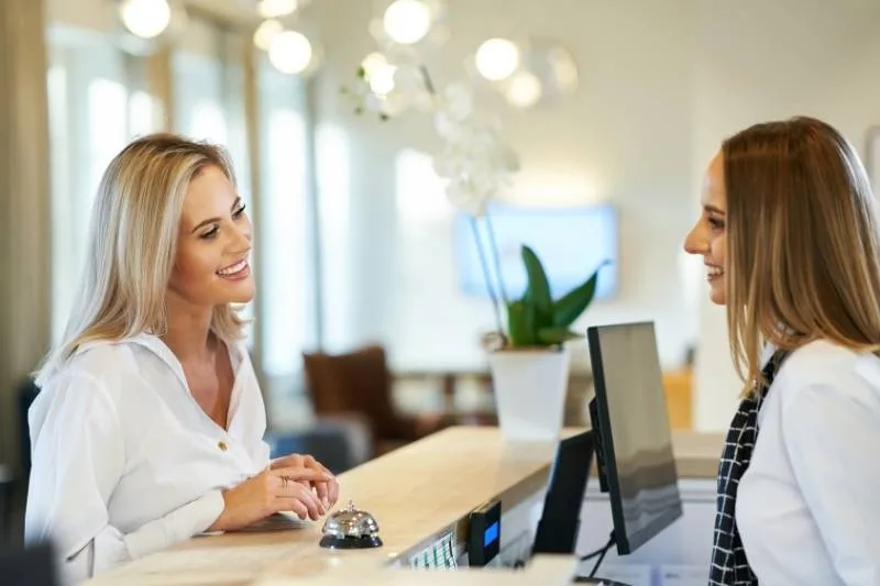 Learn the differences between visitor management systems vs. staffed front desks