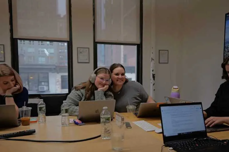 Members of the ButterflyMX marketing team working in office in NYC.