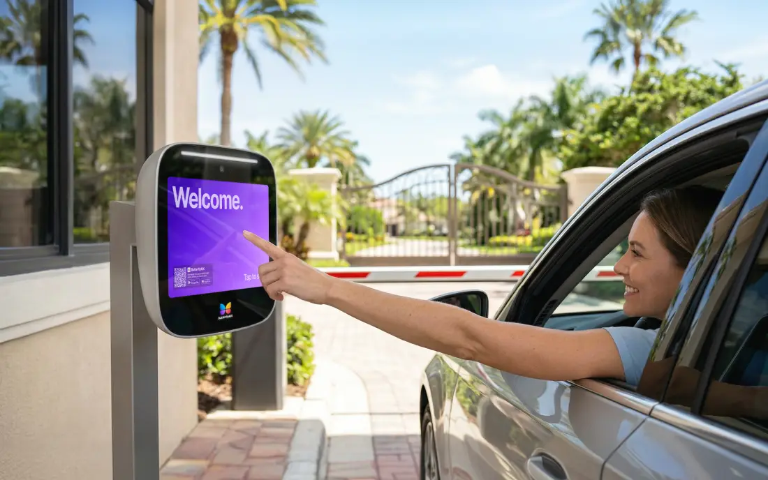 Visitor at a Video Intercom, resident answering on phone